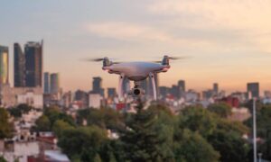 Drone flying in Nashville City, demonstrating drone surveys capabilities for land mapping and property analysis.
