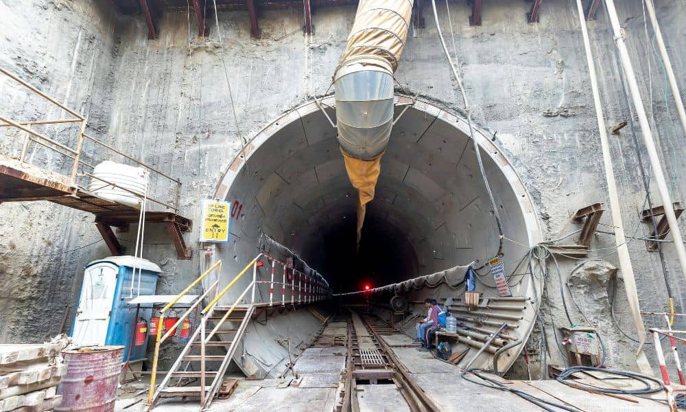 Tunnel entrance under construction showing ground conditions and monitoring details relevant to geotechnical engineering